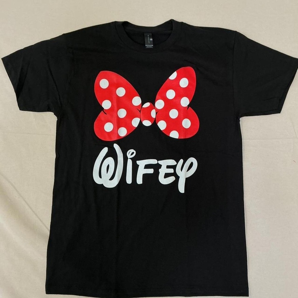 Cute black graphic tee featuring a red polka dot bow and "Wifey" design